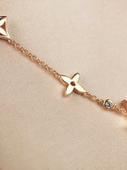 TimiSTAR AND SUN 7 MOTIFS GOLD BRACELET